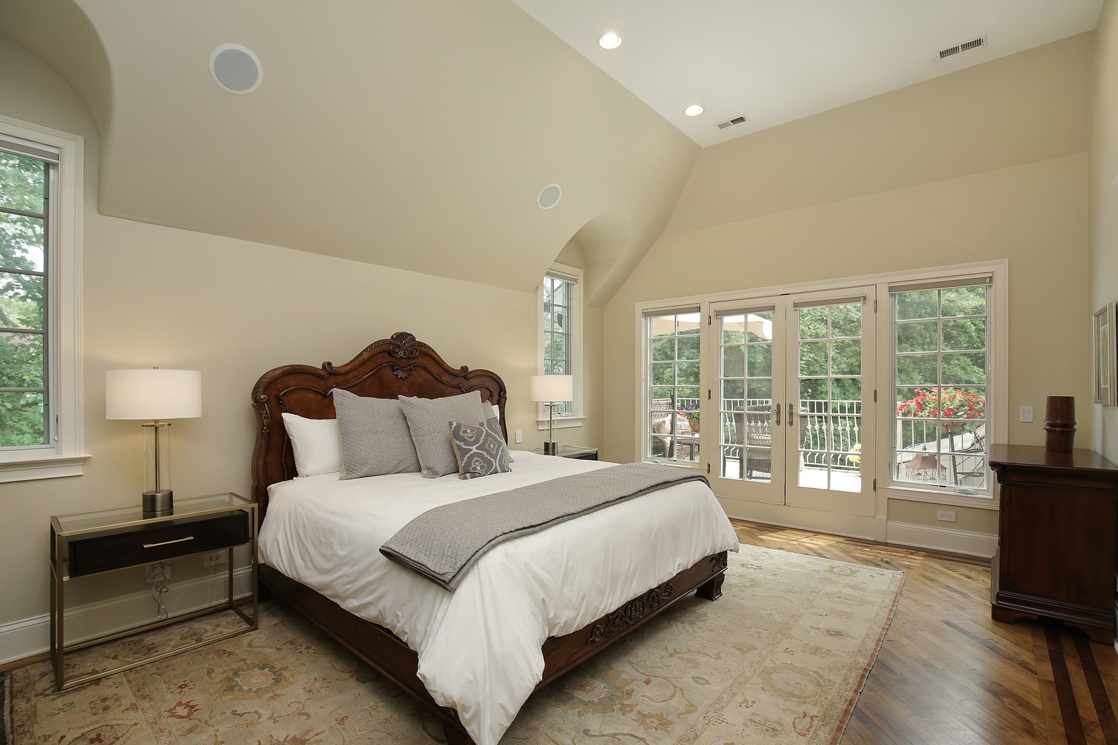 166 Lapier Street Glencoe, IL 60022 - Photo 16 of 32 a bedroom with a bed and a lamp