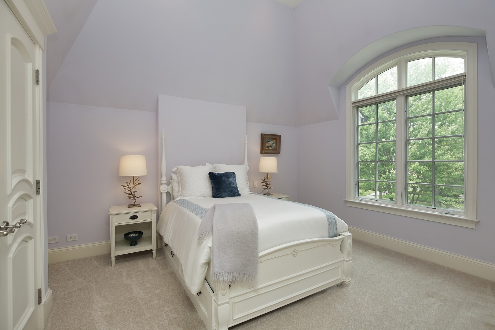 166 Lapier Street Glencoe, IL 60022 - Photo 21 of 32 a bedroom with a bed next to a window