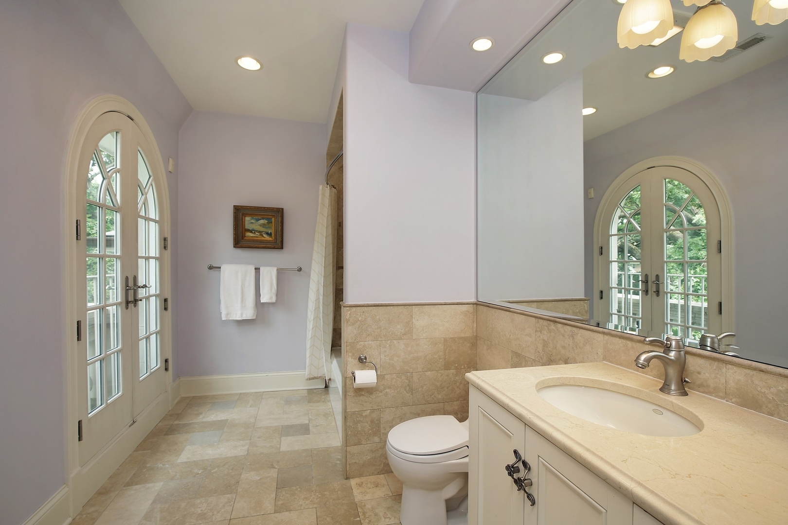 166 Lapier Street Glencoe, IL 60022 - Photo 22 of 32 a bathroom with a double vanity sink toilet and a mirror