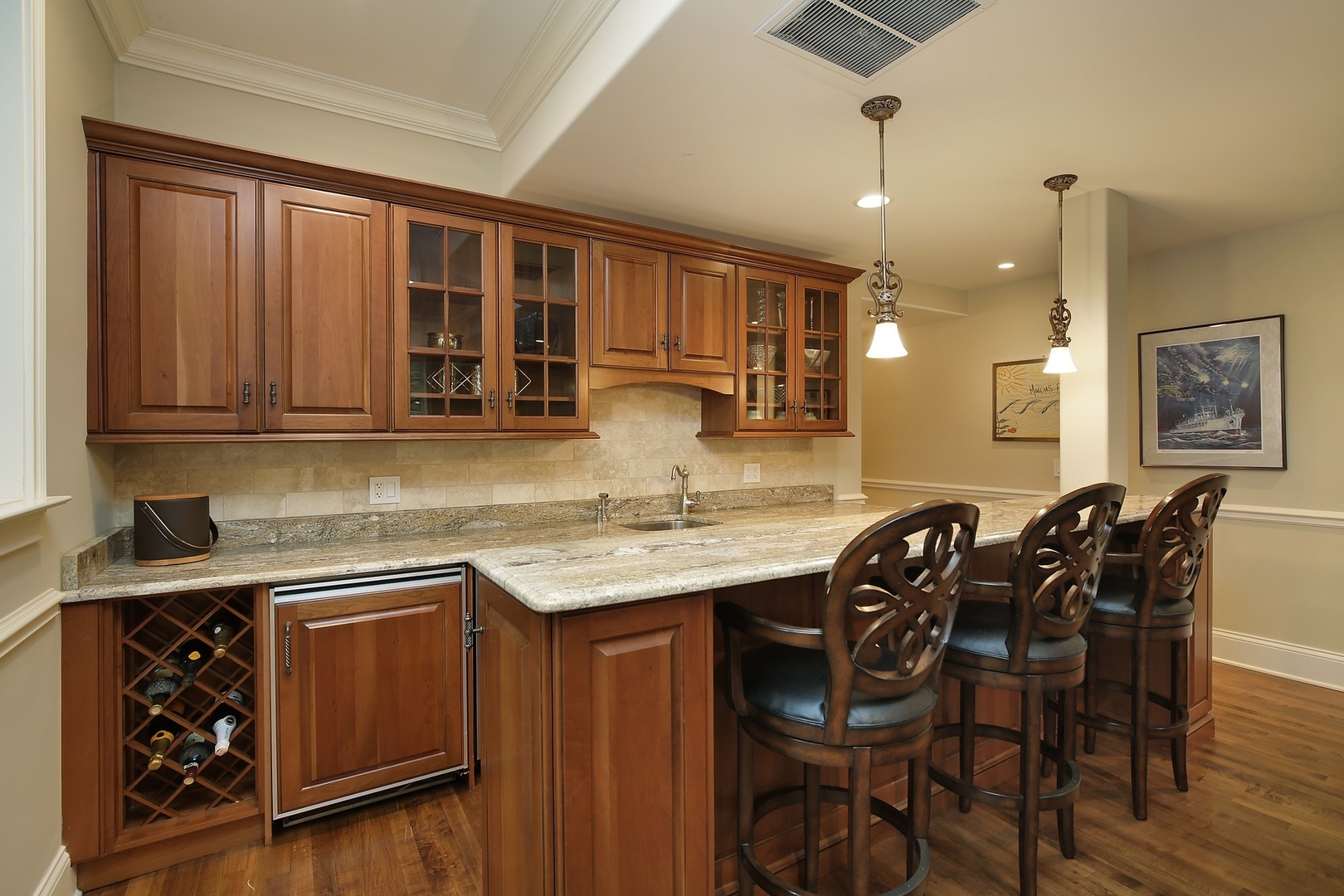 166 Lapier Street Glencoe, IL 60022 - Photo 25 of 32 a kitchen with stainless steel appliances granite countertop a sink and a refrigerator