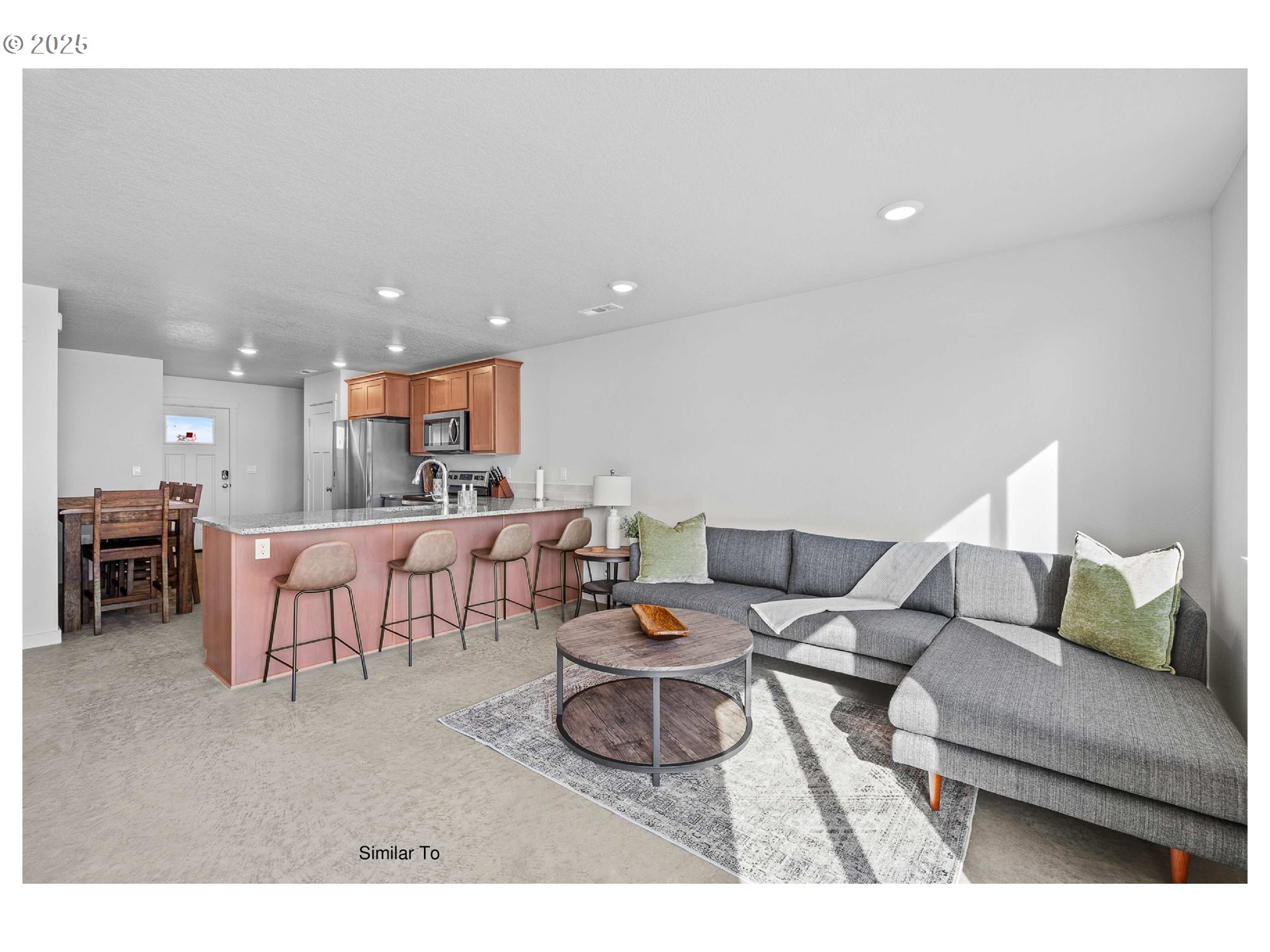650 Jimmy Street Stanfield, OR 97875 - Photo 14 of 18 a living room with furniture and a table