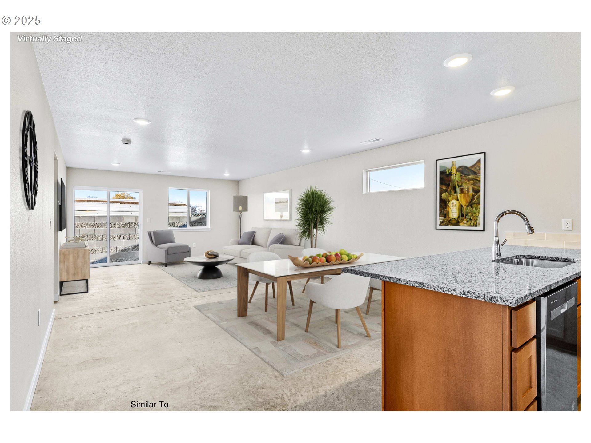 650 Jimmy Street Stanfield, OR 97875 - Photo 8 of 18 a living room with stainless steel appliances furniture a rug and a kitchen view