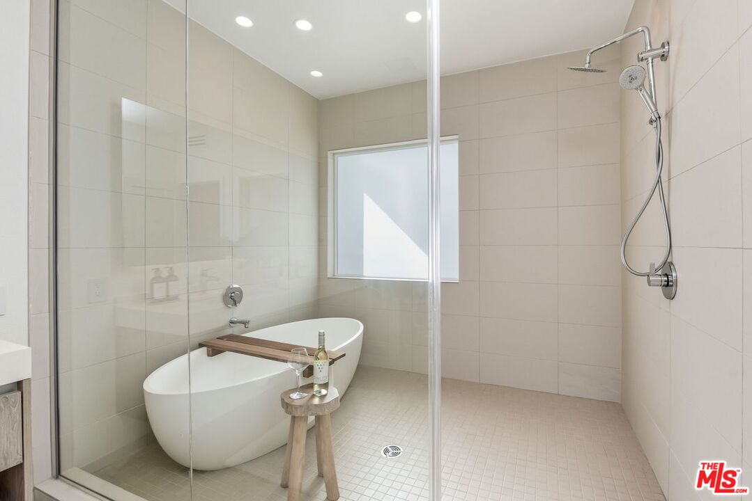 6487 Cavalleri Road, Unit 333 Malibu, CA 90265 - Photo 6 of 14 a bathroom with a sink toilet and shower