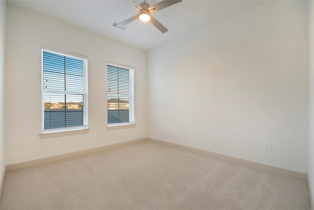 4700 West Spring Creek Parkway, Unit 10102 Plano, TX 75024 - Photo 12 of 20 an empty room with a window