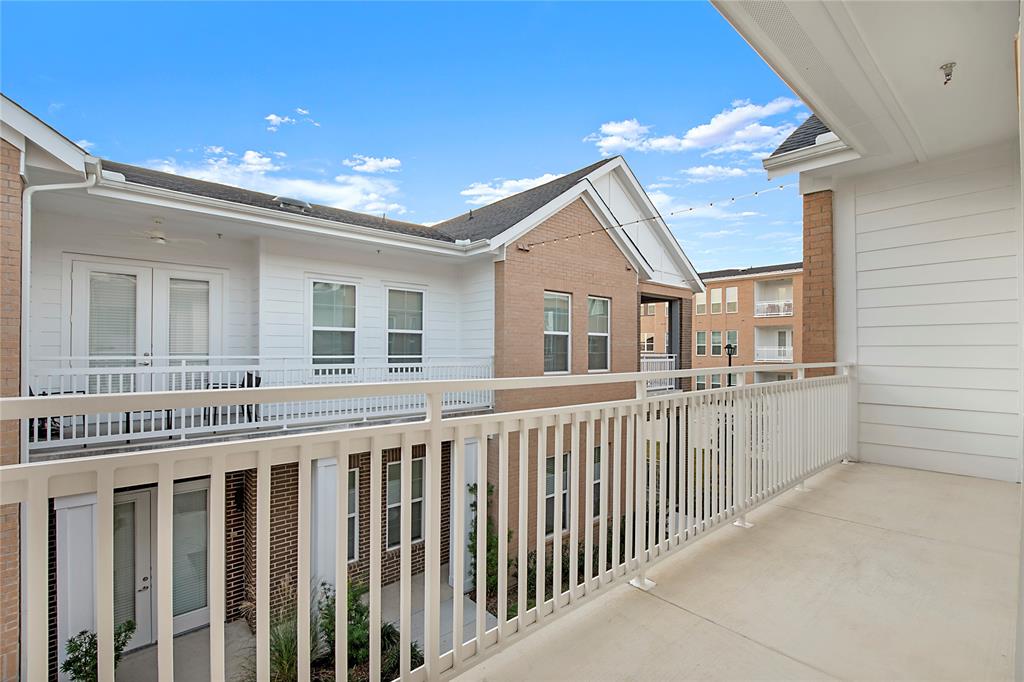 4700 West Spring Creek Parkway, Unit 10102 Plano, TX 75024 - Photo 5 of 20 a view of a house with a balcony