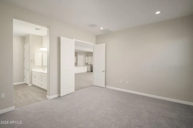 a view of a room with white walls