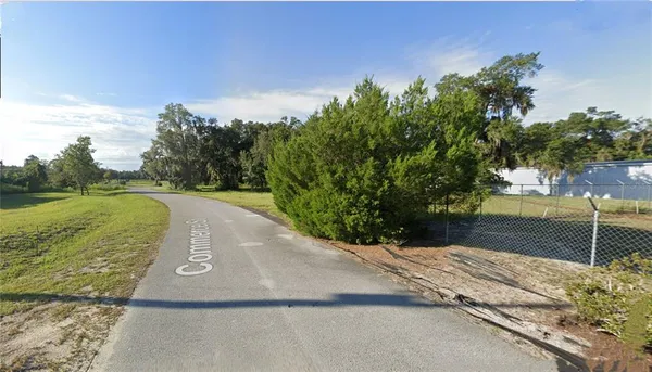 a view of a golf course with a lake