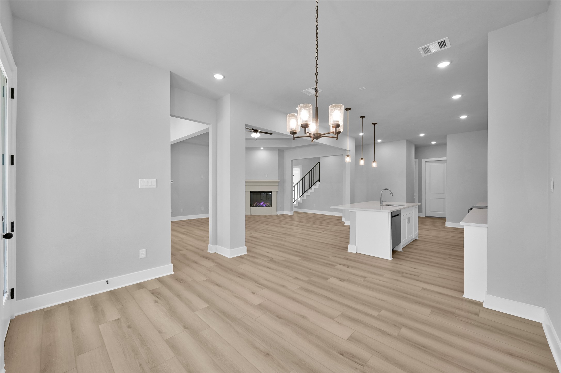 28502 Tallow Rock Lane Huffman, TX 77336 - Photo 11 of 30 a view of kitchen with furniture and wooden floor