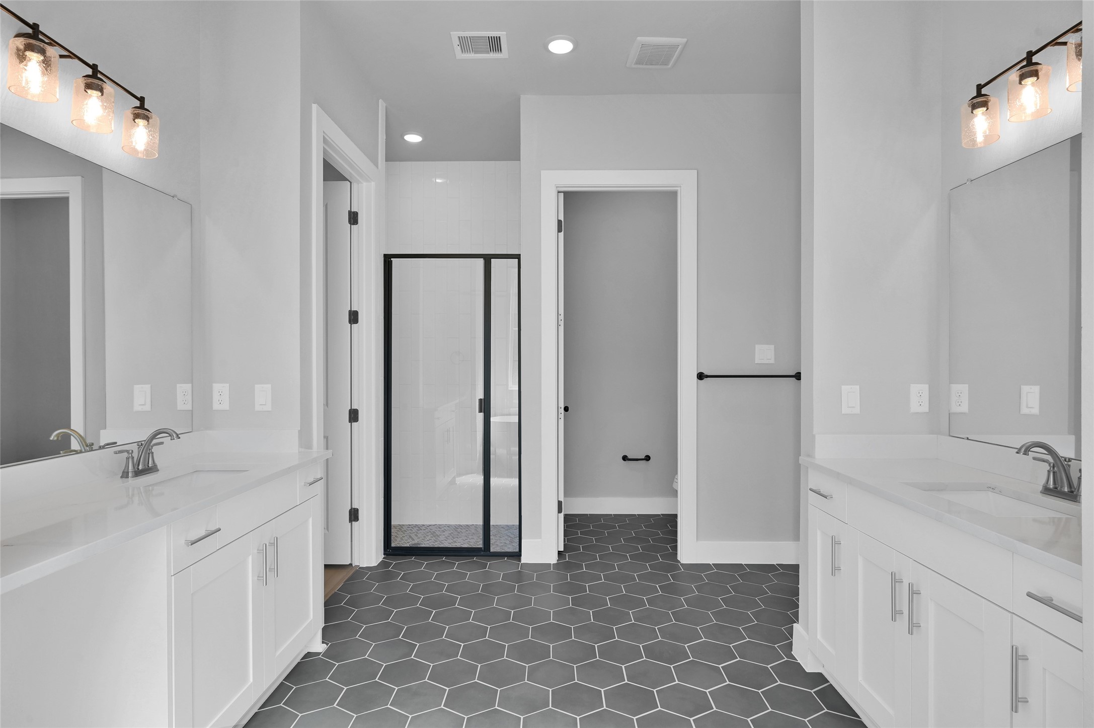 28502 Tallow Rock Lane Huffman, TX 77336 - Photo 17 of 30 a spacious bathroom with a double vanity sink mirror and double