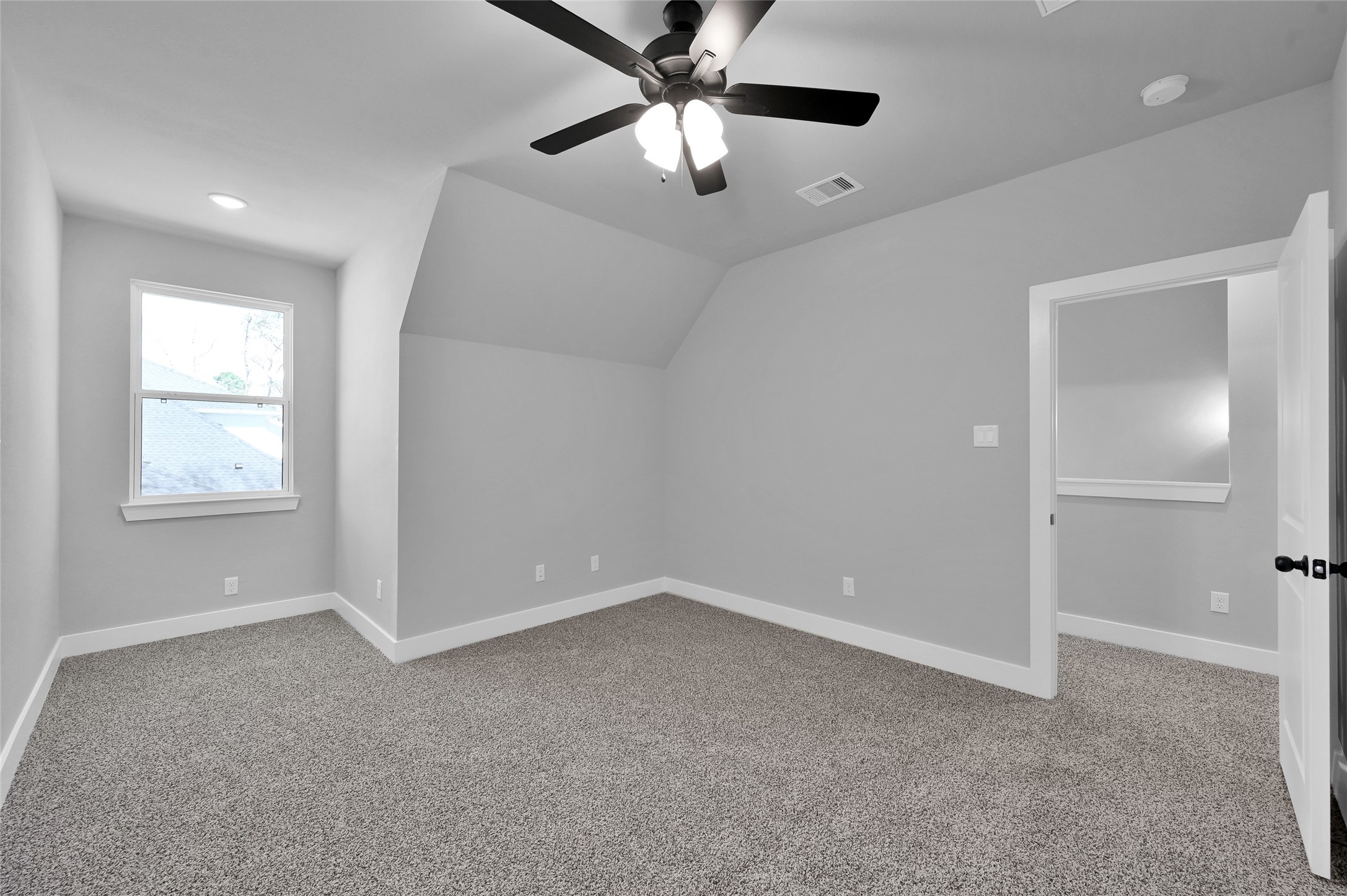 28502 Tallow Rock Lane Huffman, TX 77336 - Photo 19 of 30 wooden floor in an empty room with a window