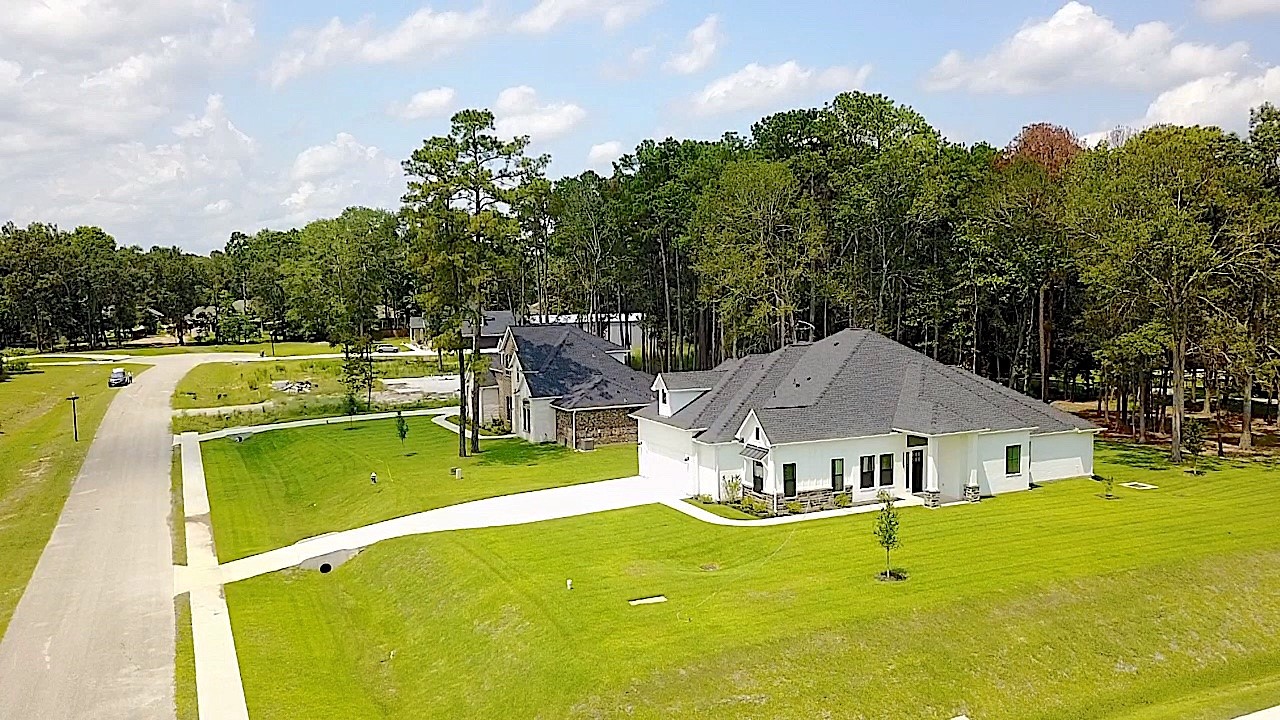 28502 Tallow Rock Lane Huffman, TX 77336 - Photo 29 of 30 a view of a house with pool