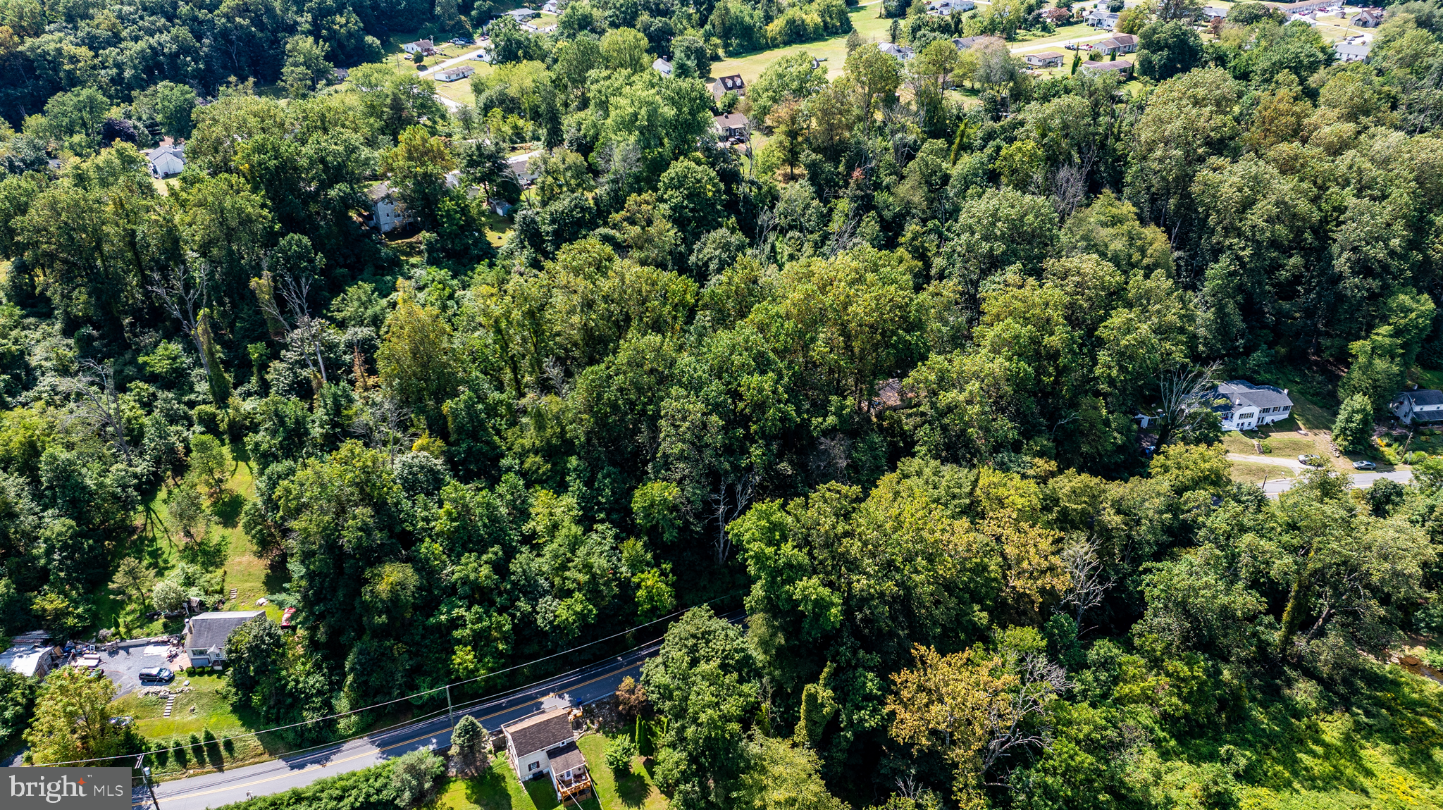 721 Wagontown Road Coatesville, PA 19320 - Photo 12 of 20 an aerial view of residential house with outdoor space and trees all around