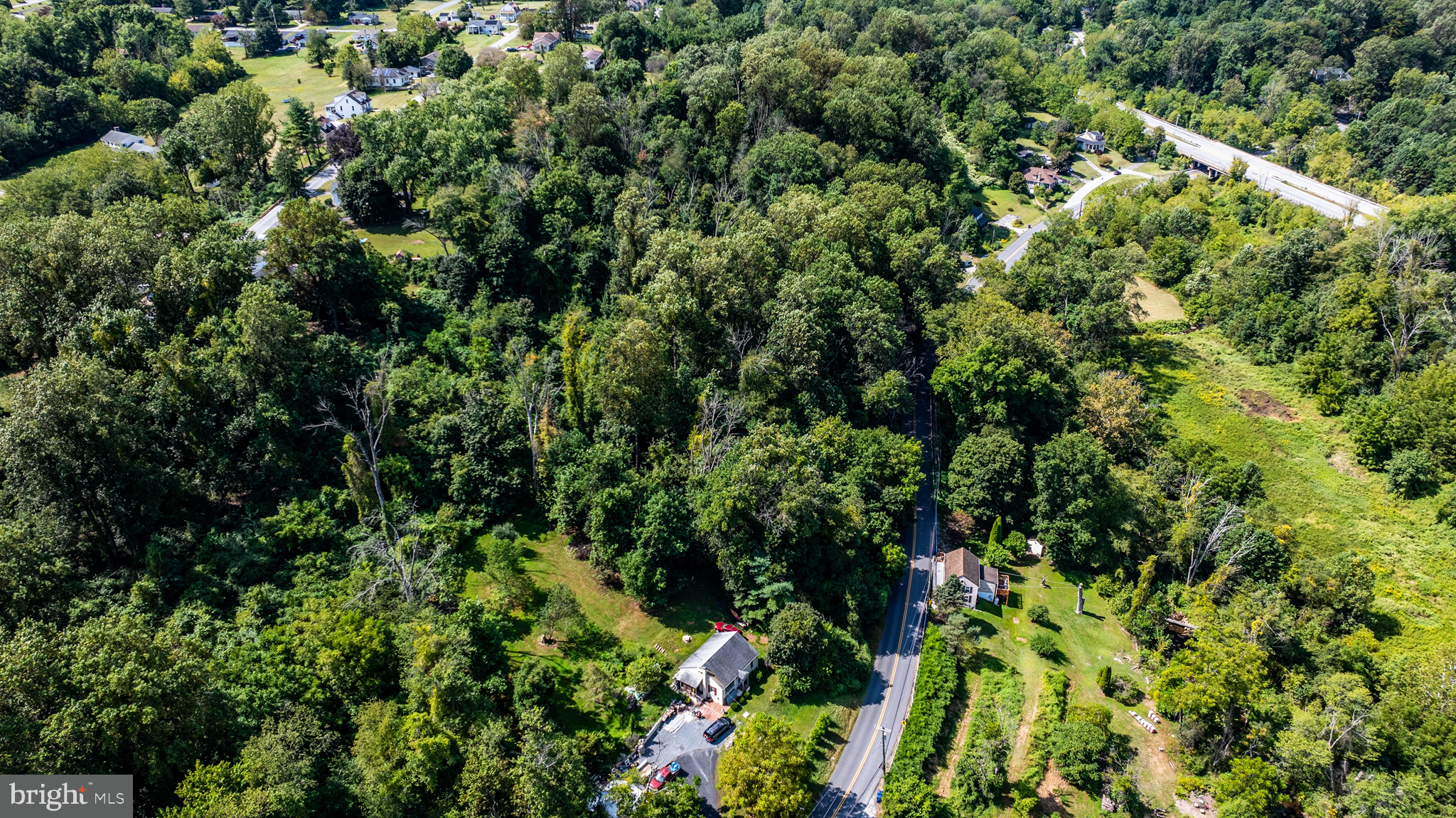721 Wagontown Road Coatesville, PA 19320 - Photo 10 of 20 an aerial view of residential house with outdoor space and trees all around