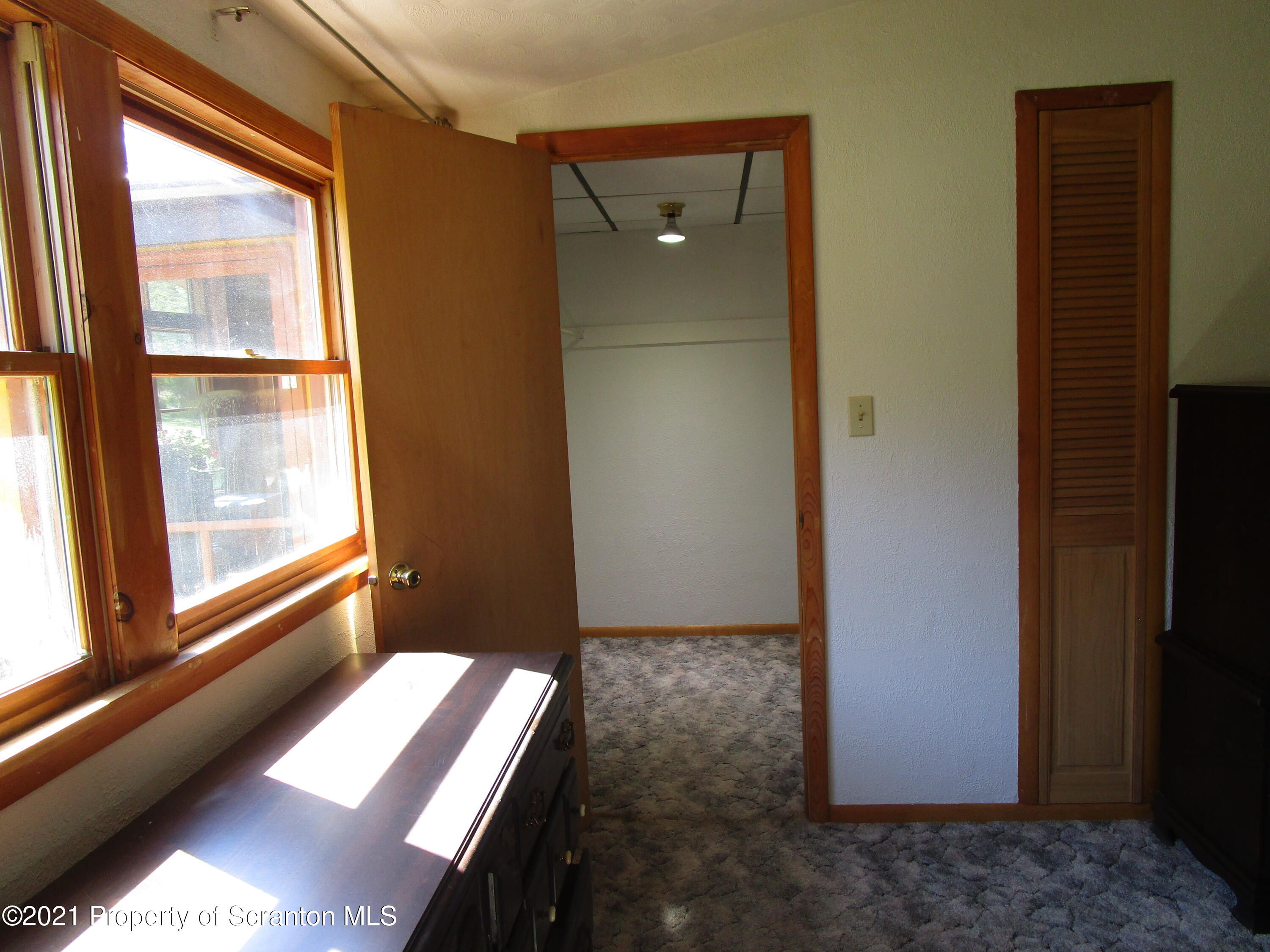 1709 Mill Creek Road Le Raysville, PA 18829 - Photo 21 of 41 a view of an empty room and window