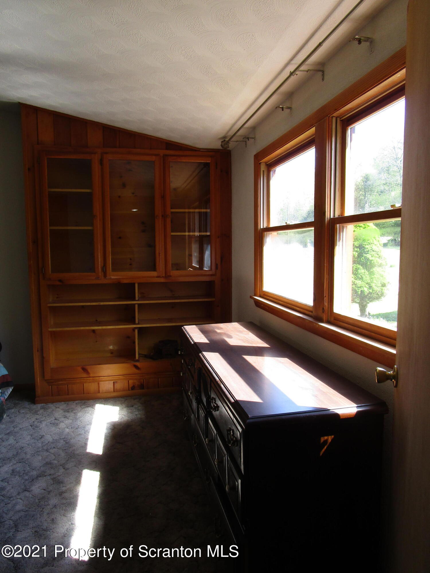 1709 Mill Creek Road Le Raysville, PA 18829 - Photo 22 of 41 a room with a window and wooden floor