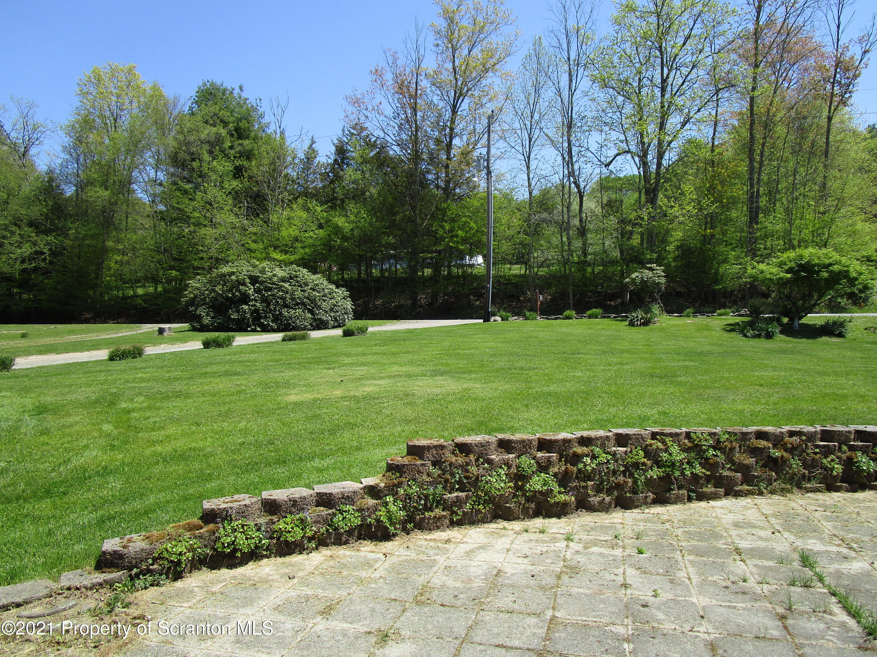 1709 Mill Creek Road Le Raysville, PA 18829 - Photo 28 of 41 a view of a golf course with a yard