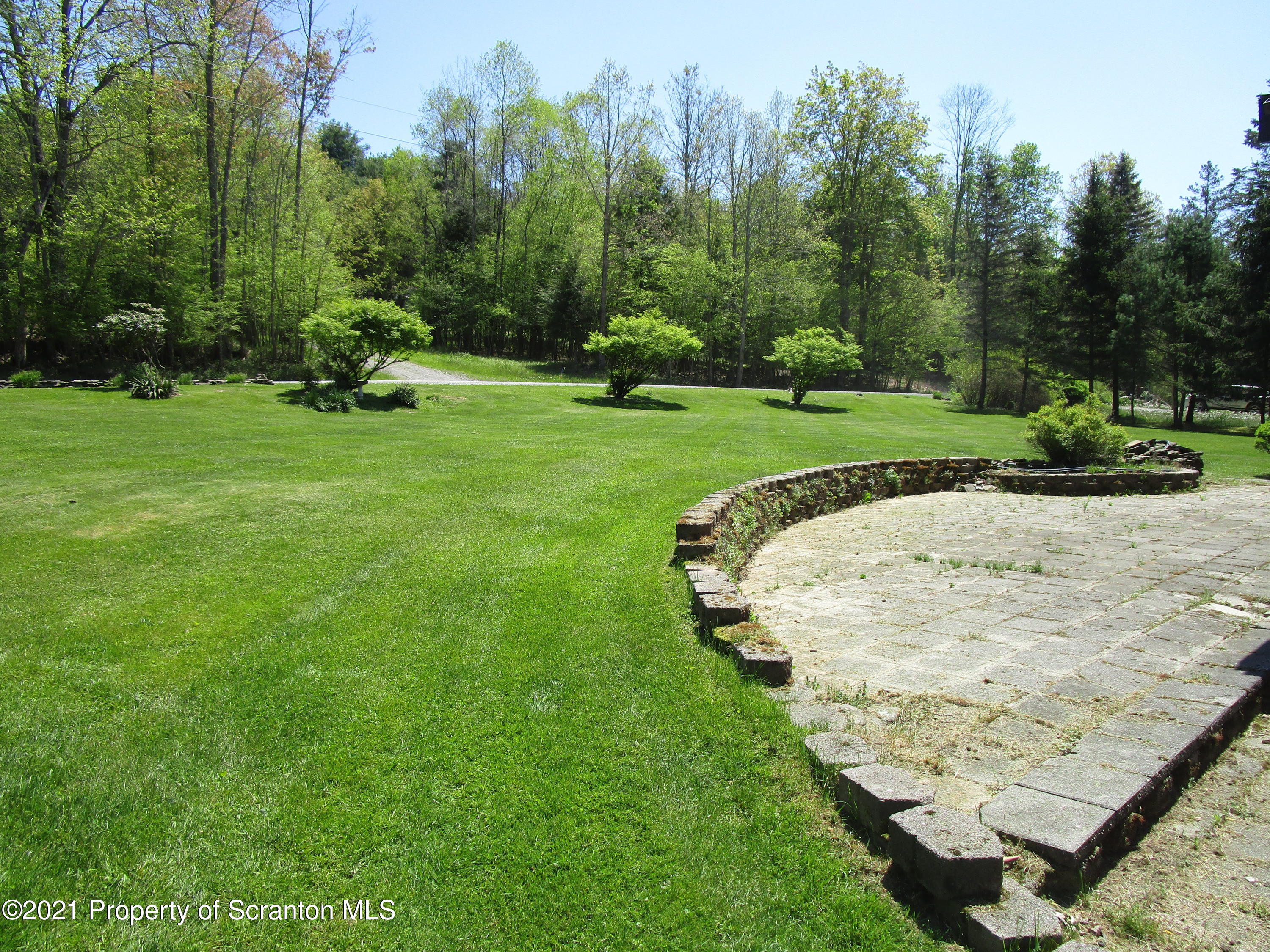 1709 Mill Creek Road Le Raysville, PA 18829 - Photo 29 of 41 a view of a park with large trees