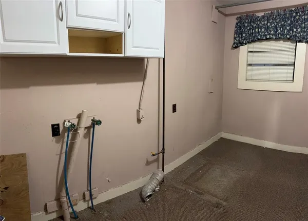 a view of a room with rack on the wall