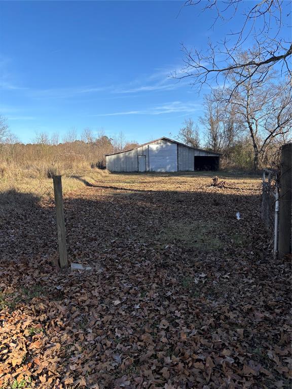 295 Calvin Liner Road Minden, LA 71055 - Photo 17 of 21 a view of a yard with wooden fence