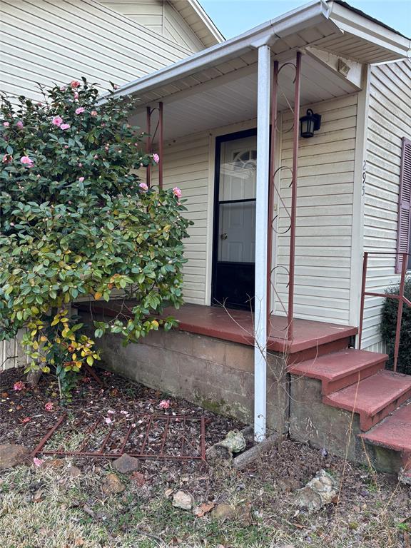 295 Calvin Liner Road Minden, LA 71055 - Photo 2 of 21 a backyard of a house with plants and outdoor seating