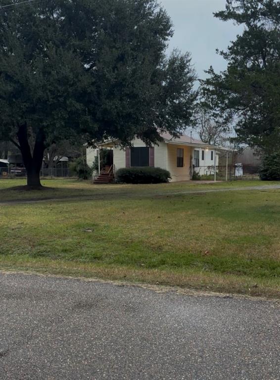 295 Calvin Liner Road Minden, LA 71055 - Photo 21 of 21 a front view of a house with a garden