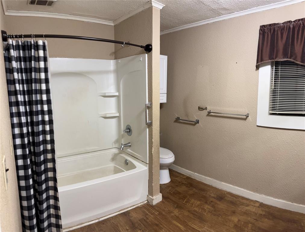 295 Calvin Liner Road Minden, LA 71055 - Photo 8 of 21 a bathroom with a bathtub and a shower