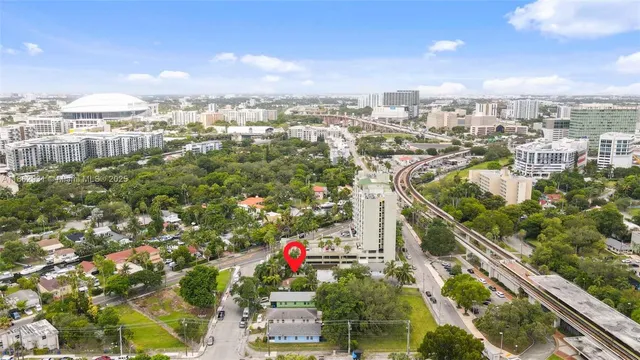 an aerial view of city and lake