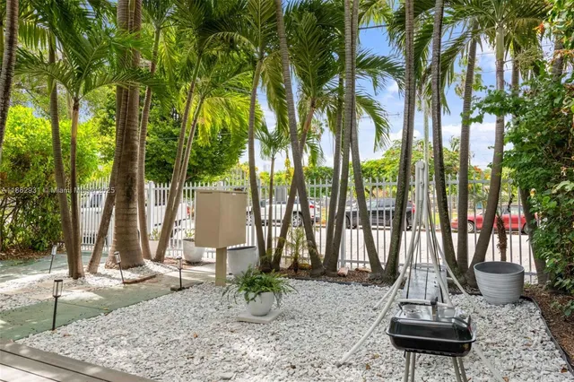 a view of a park with a tree