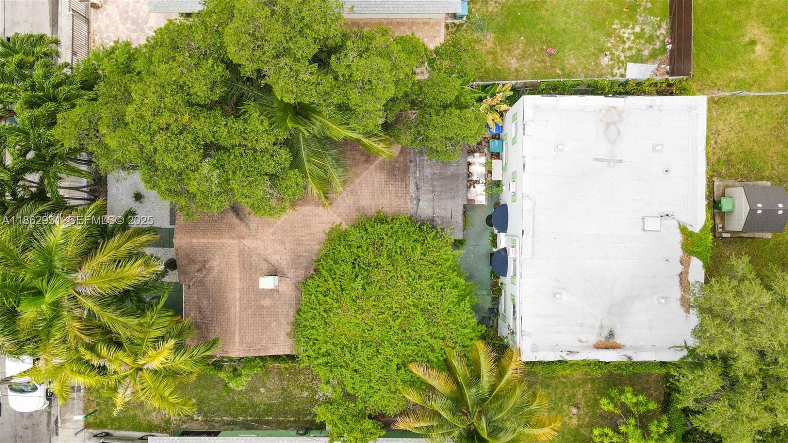 769 Northwest 10th Street Miami, FL 33136 - Photo 10 of 25 an aerial view of a house with a yard
