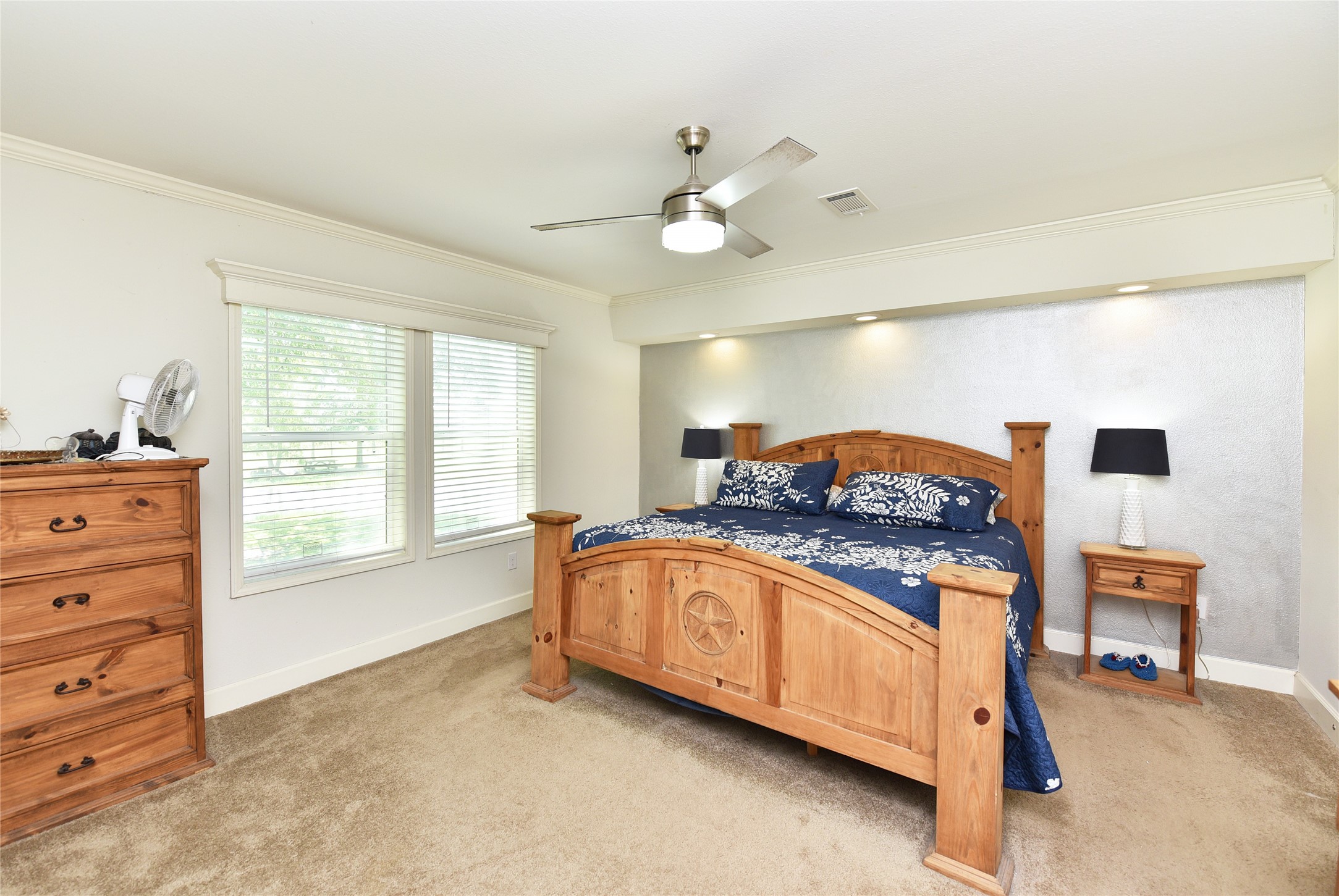 3221 Pecha Lane Rosenberg, TX 77471 - Photo 13 of 46 a spacious bedroom with a bed and a window
