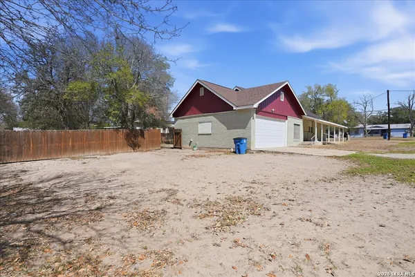 a house with trees in front of it