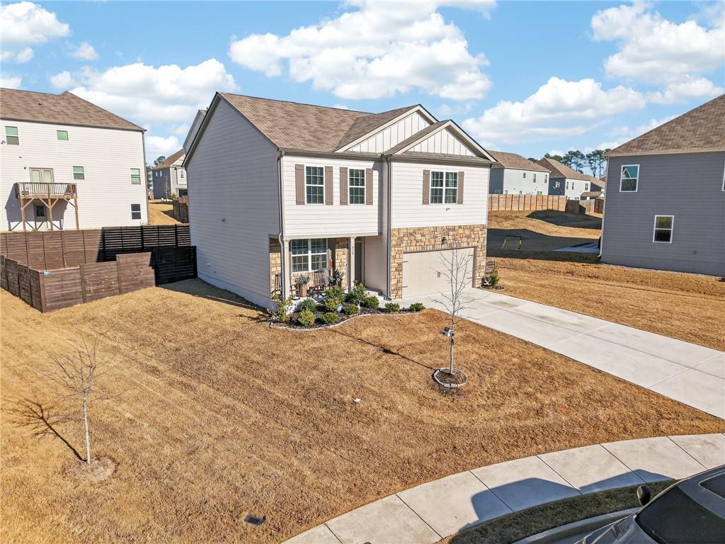 930 Sly Fox Run Fairburn, GA 30213 - Photo 26 of 28 a view of a house with a snow on the road