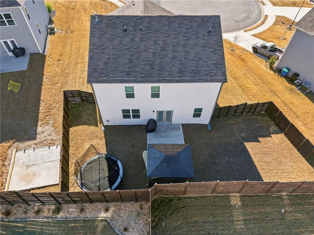 930 Sly Fox Run Fairburn, GA 30213 - Photo 28 of 28 an aerial view of residential houses with outdoor space