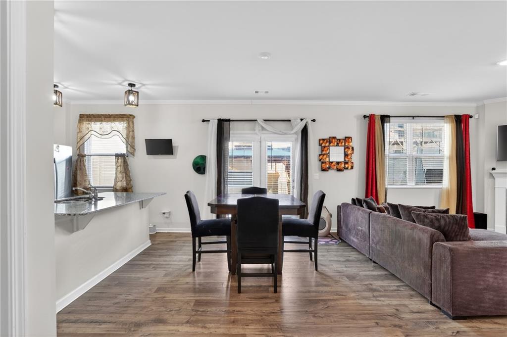 930 Sly Fox Run Fairburn, GA 30213 - Photo 9 of 28 a dining room with furniture and window