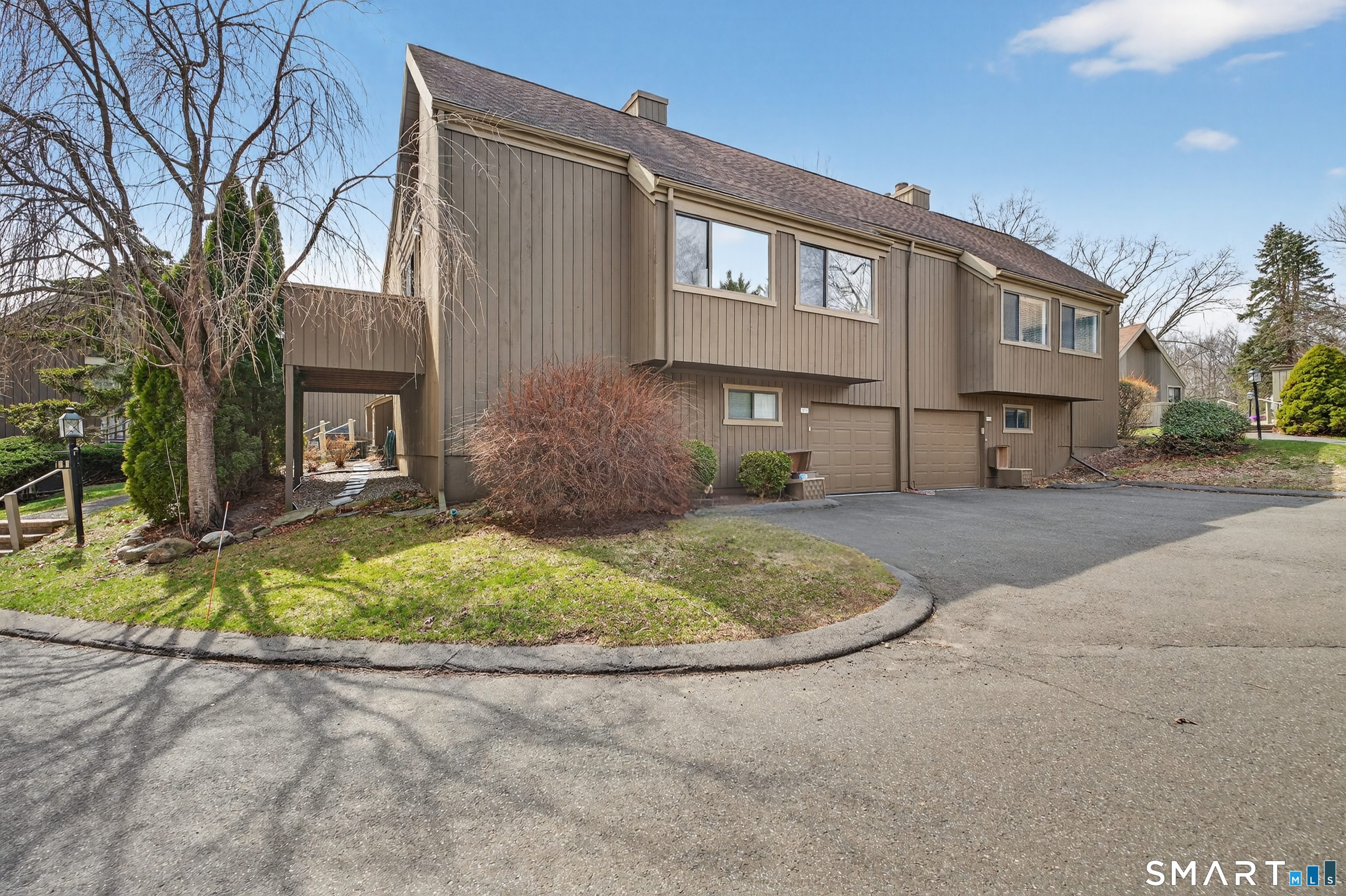 196 Apache Lane, Unit A Stratford, CT 06614 - Photo 2 of 40 a view of a house with a yard