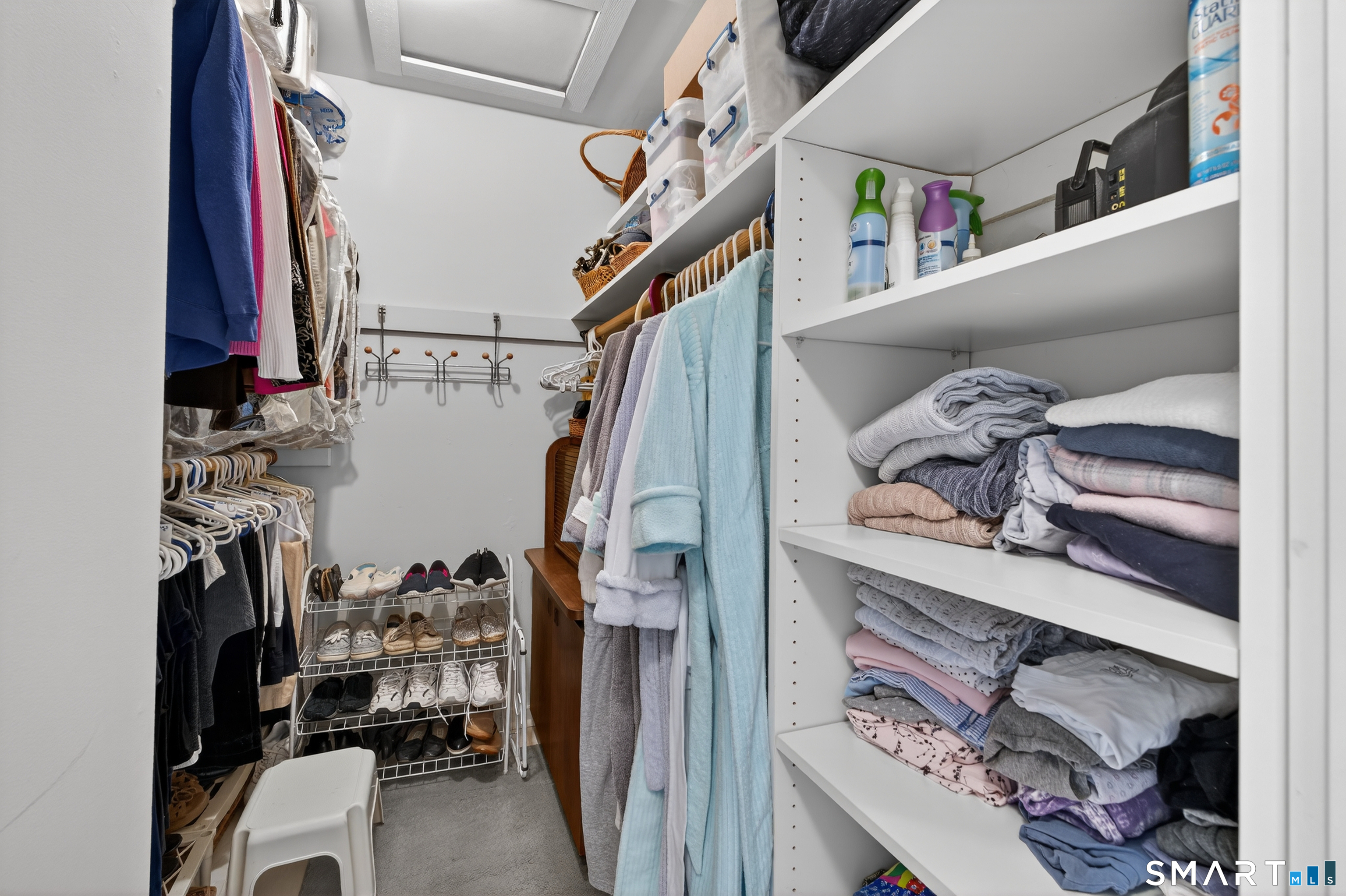 196 Apache Lane, Unit A Stratford, CT 06614 - Photo 24 of 40 a view of walk in closet with clothes and shoes