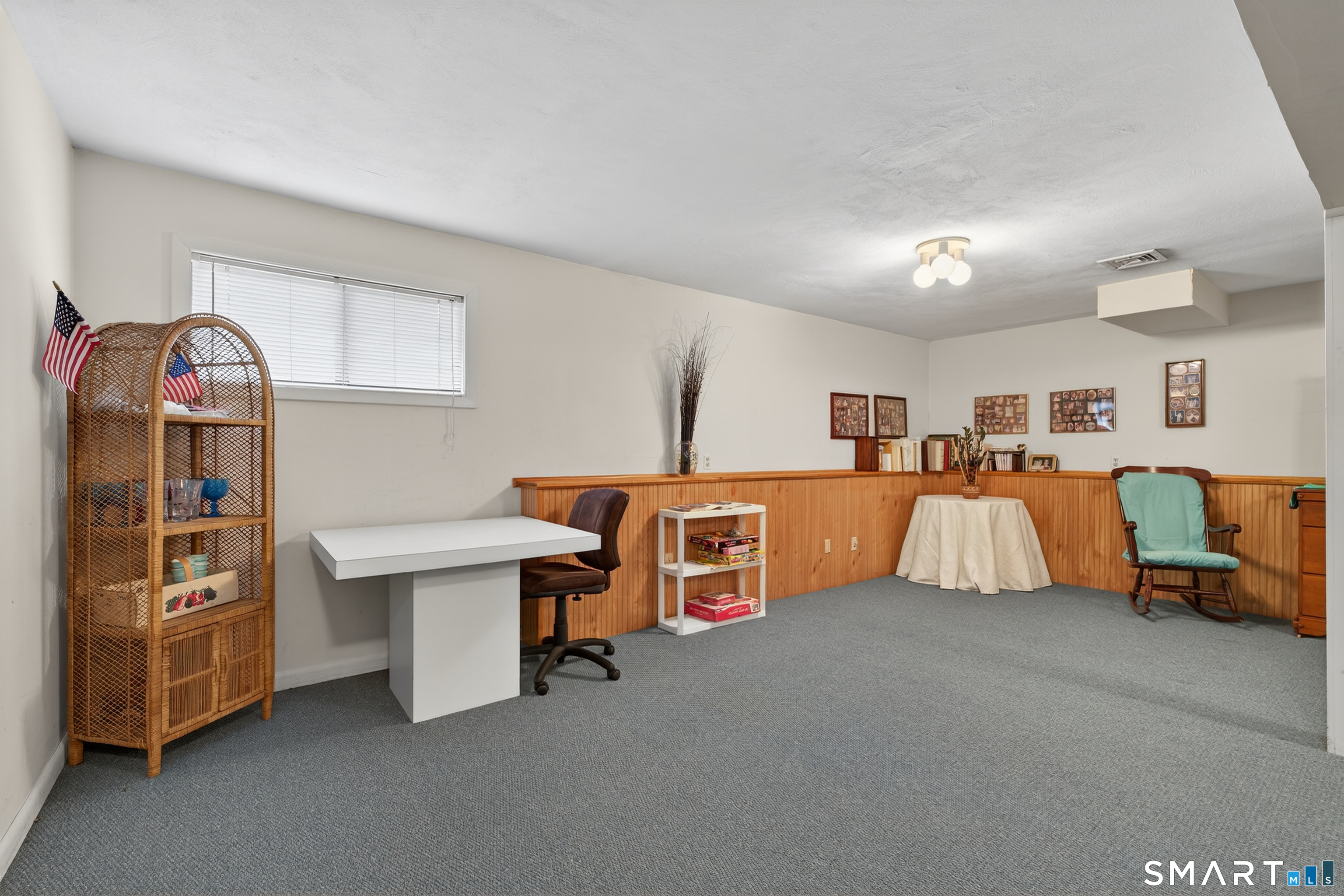 196 Apache Lane, Unit A Stratford, CT 06614 - Photo 26 of 40 a bed room with furniture and a window
