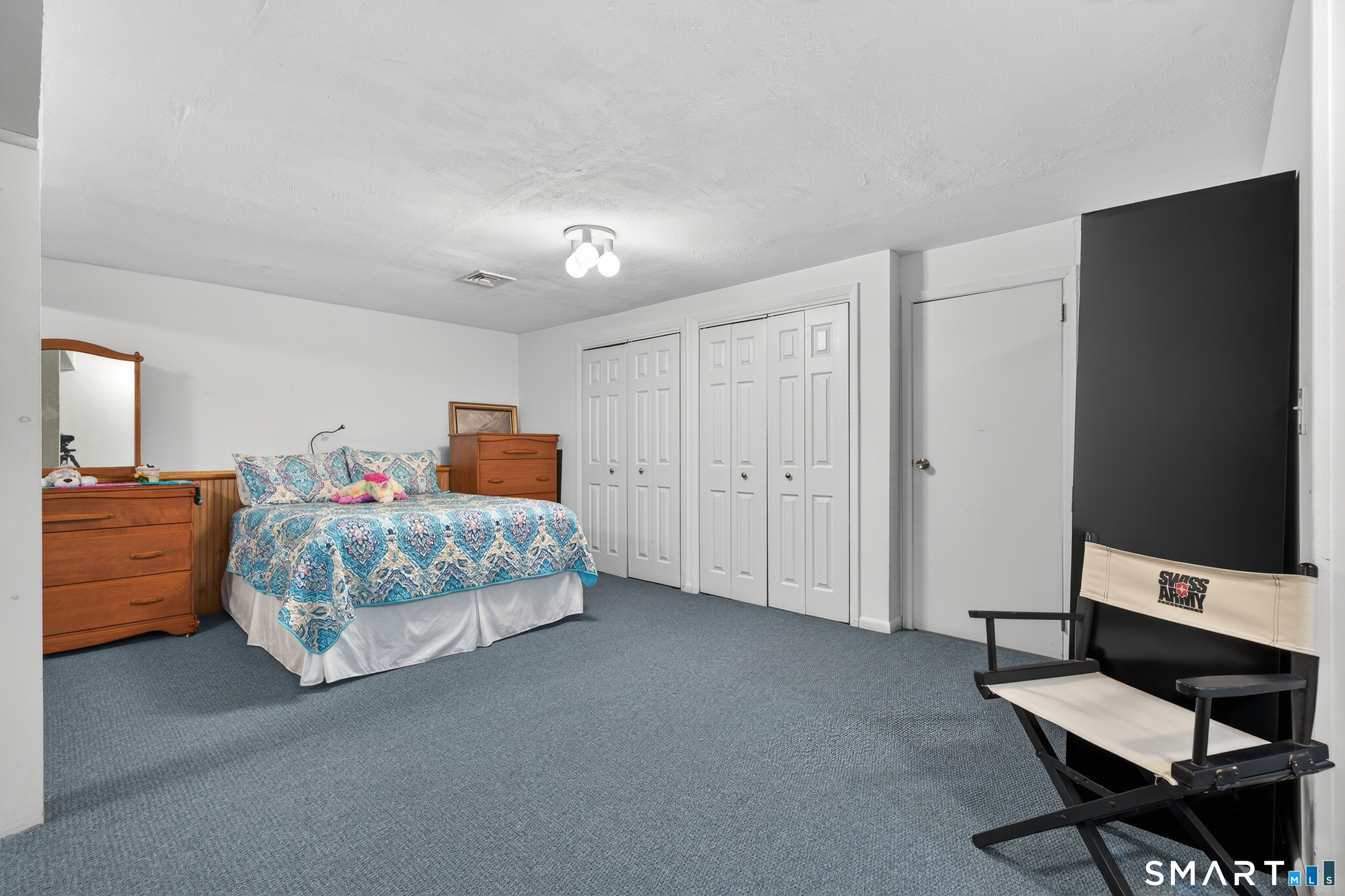196 Apache Lane, Unit A Stratford, CT 06614 - Photo 29 of 40 a bedroom with bed and window