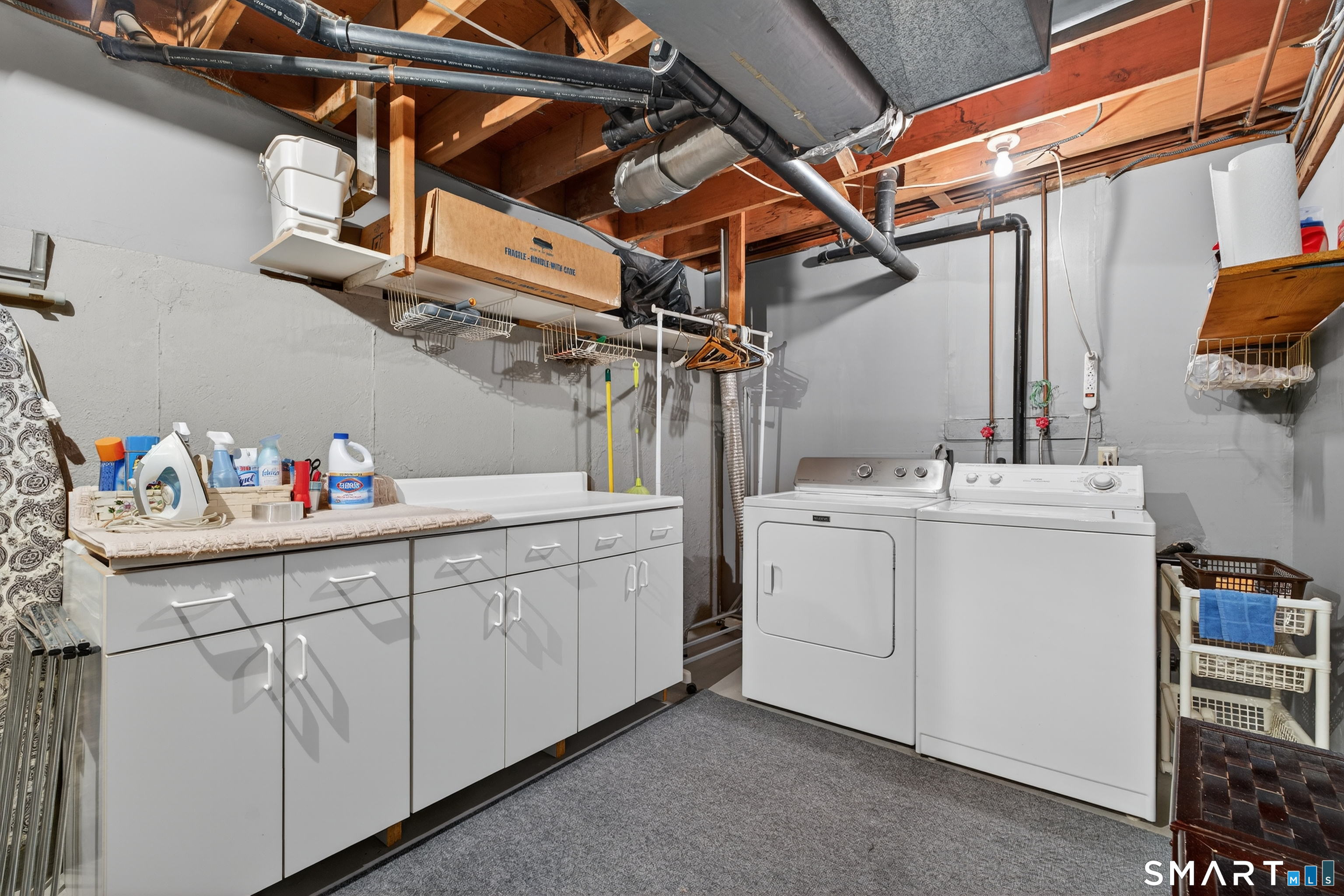 196 Apache Lane, Unit A Stratford, CT 06614 - Photo 33 of 40 a utility room with dryer and washer