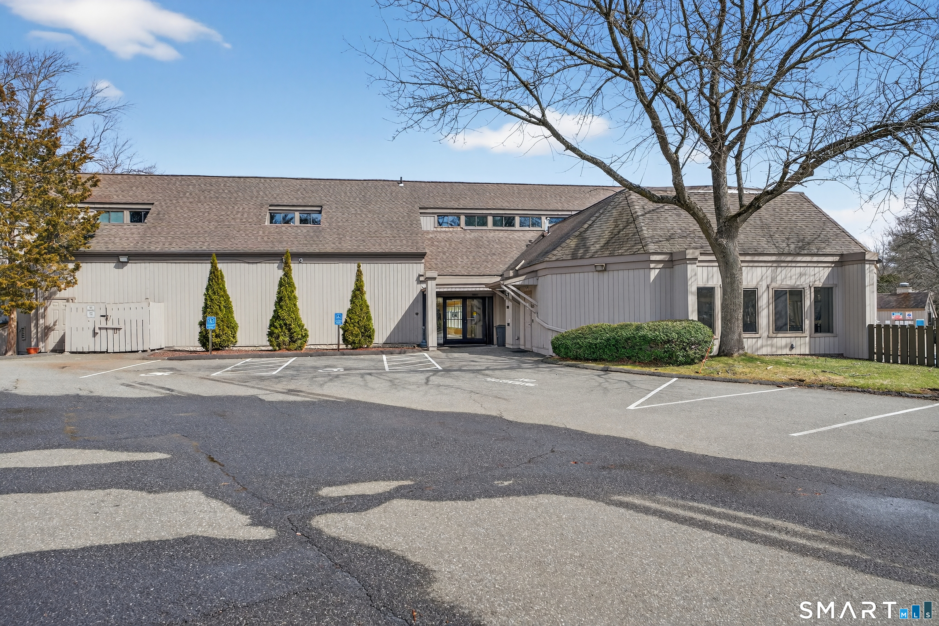 196 Apache Lane, Unit A Stratford, CT 06614 - Photo 35 of 40 front view of a house with a street