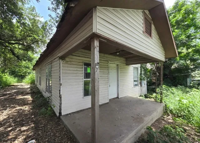 a view of a small house with a sink