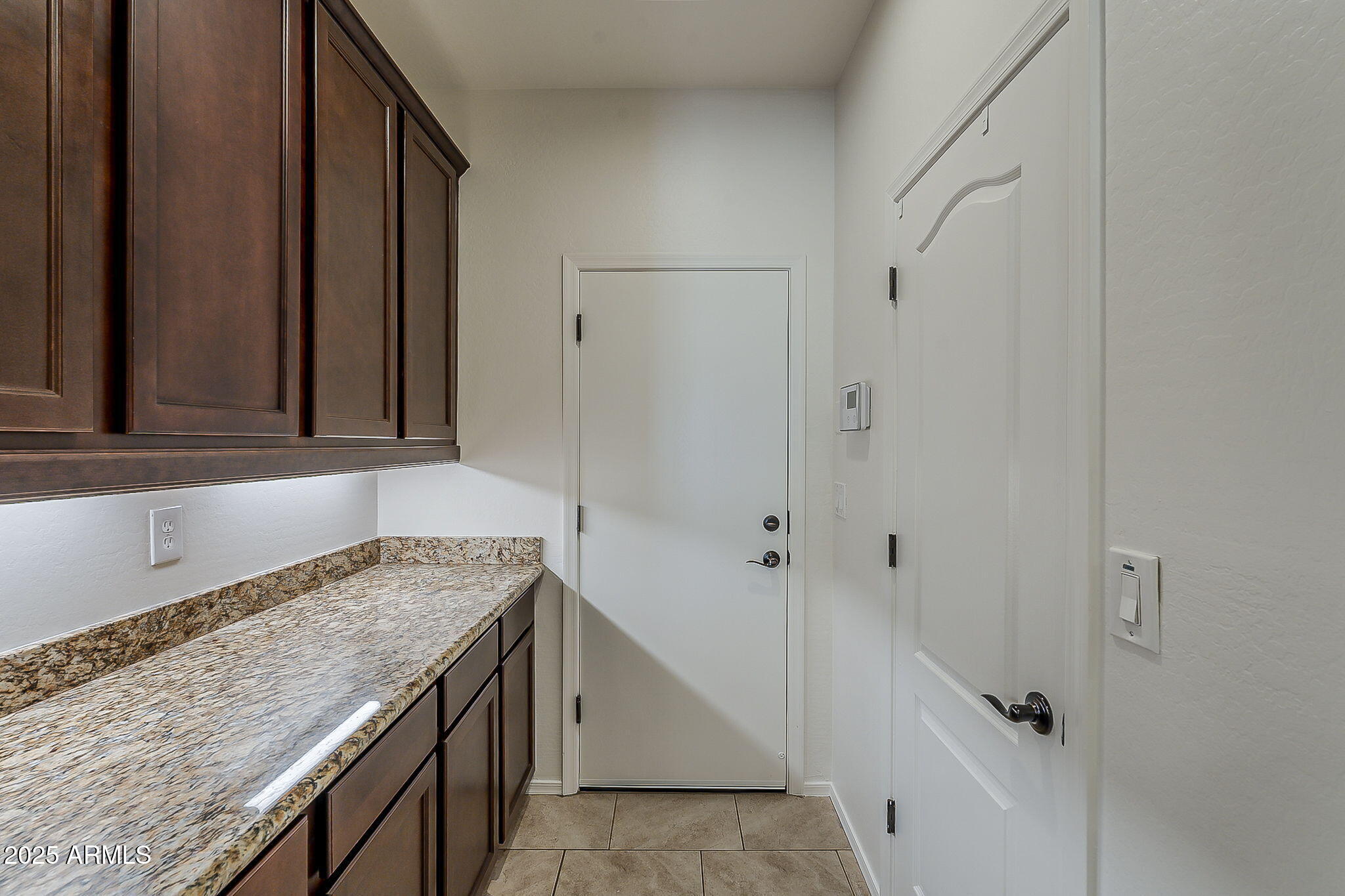 2008 East Stacey Road Gilbert, AZ 85298 - Photo 16 of 50 a bathroom with a granite countertop sink and a mirror