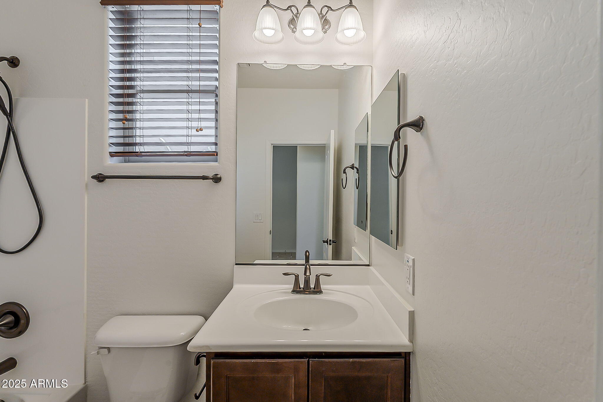 2008 East Stacey Road Gilbert, AZ 85298 - Photo 20 of 50 a bathroom with a sink a toilet and a mirror