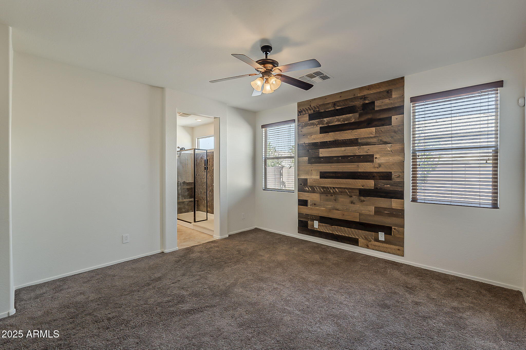 2008 East Stacey Road Gilbert, AZ 85298 - Photo 27 of 50 a view of a livingroom with a ceiling fan and window