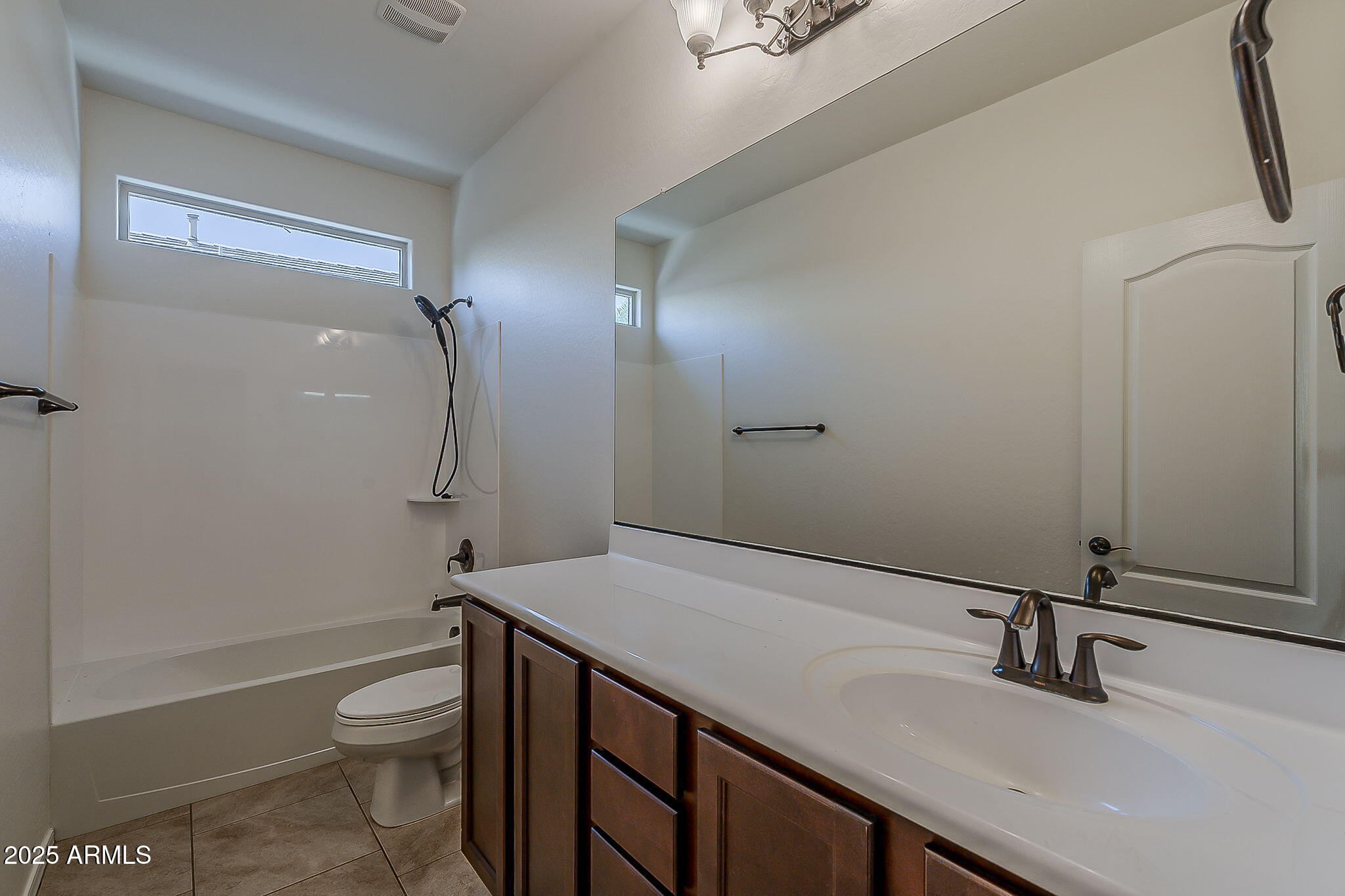 2008 East Stacey Road Gilbert, AZ 85298 - Photo 34 of 50 a bathroom with a sink a toilet and shower