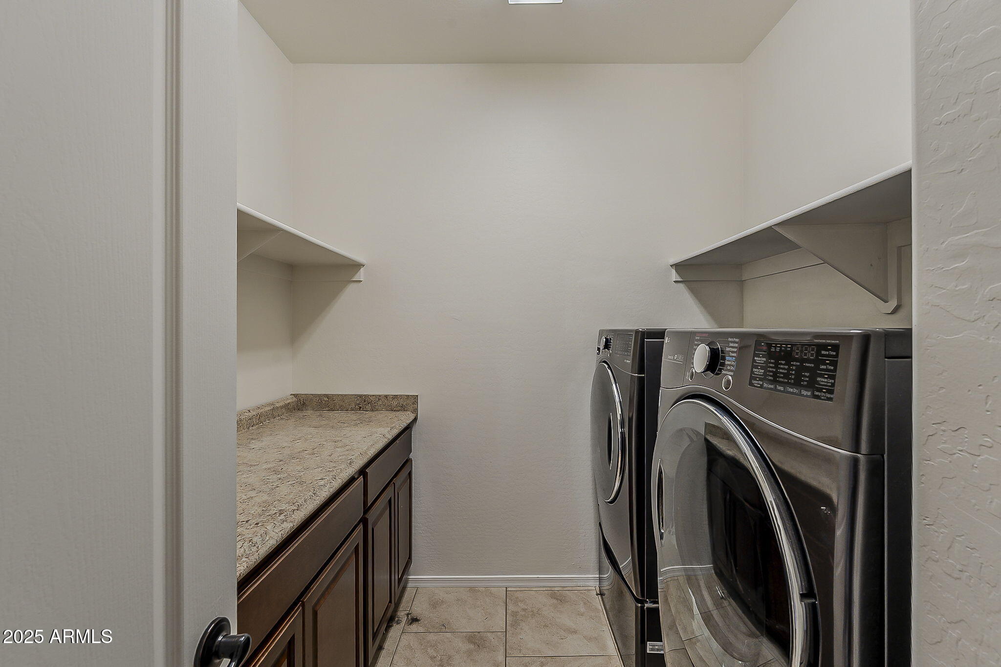 2008 East Stacey Road Gilbert, AZ 85298 - Photo 40 of 50 a utility room with dryer and washer