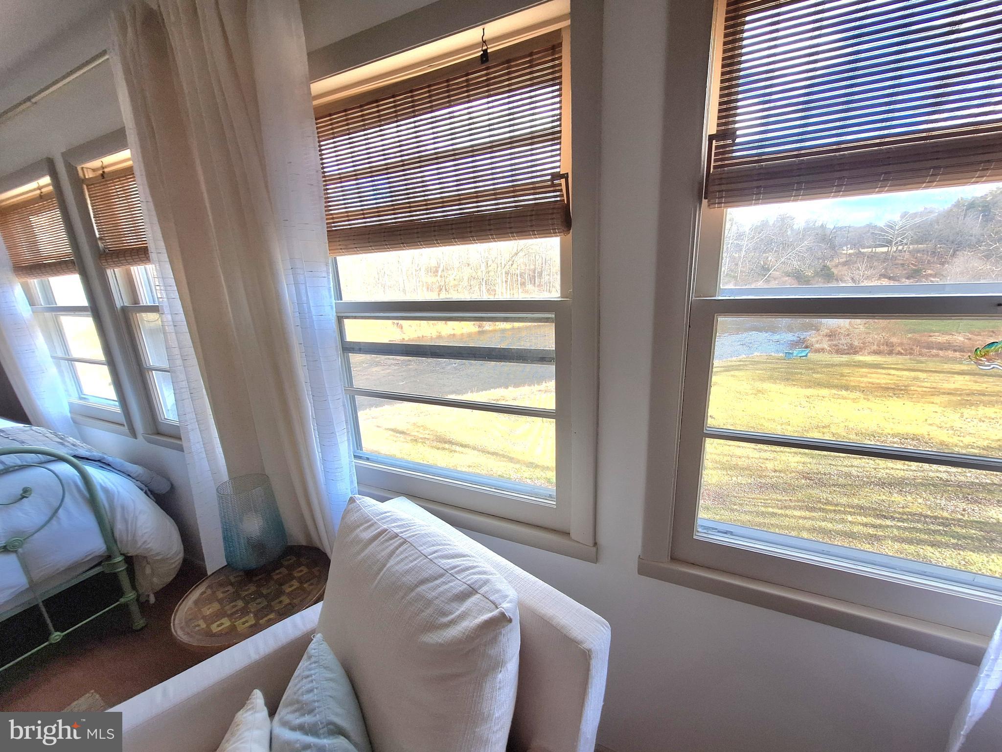 9987 Capon River Road Yellow Spring, WV 26865 - Photo 22 of 42 a living room with furniture and a window