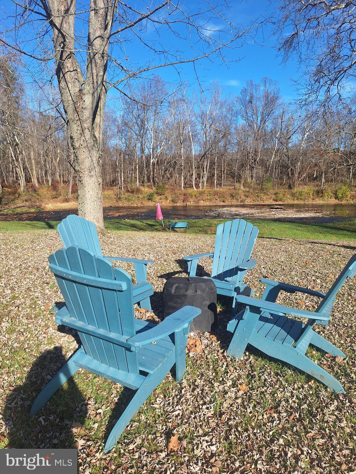 9987 Capon River Road Yellow Spring, WV 26865 - Photo 33 of 42 a view of a bench in the backyard