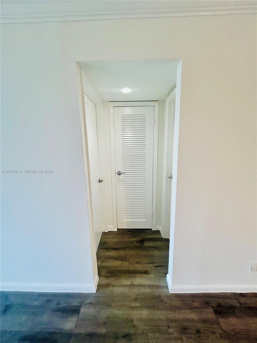3100 West Rolling Hills Circle, Unit 310 Davie, FL 33328 - Photo 20 of 39 a view of empty room with wooden floor