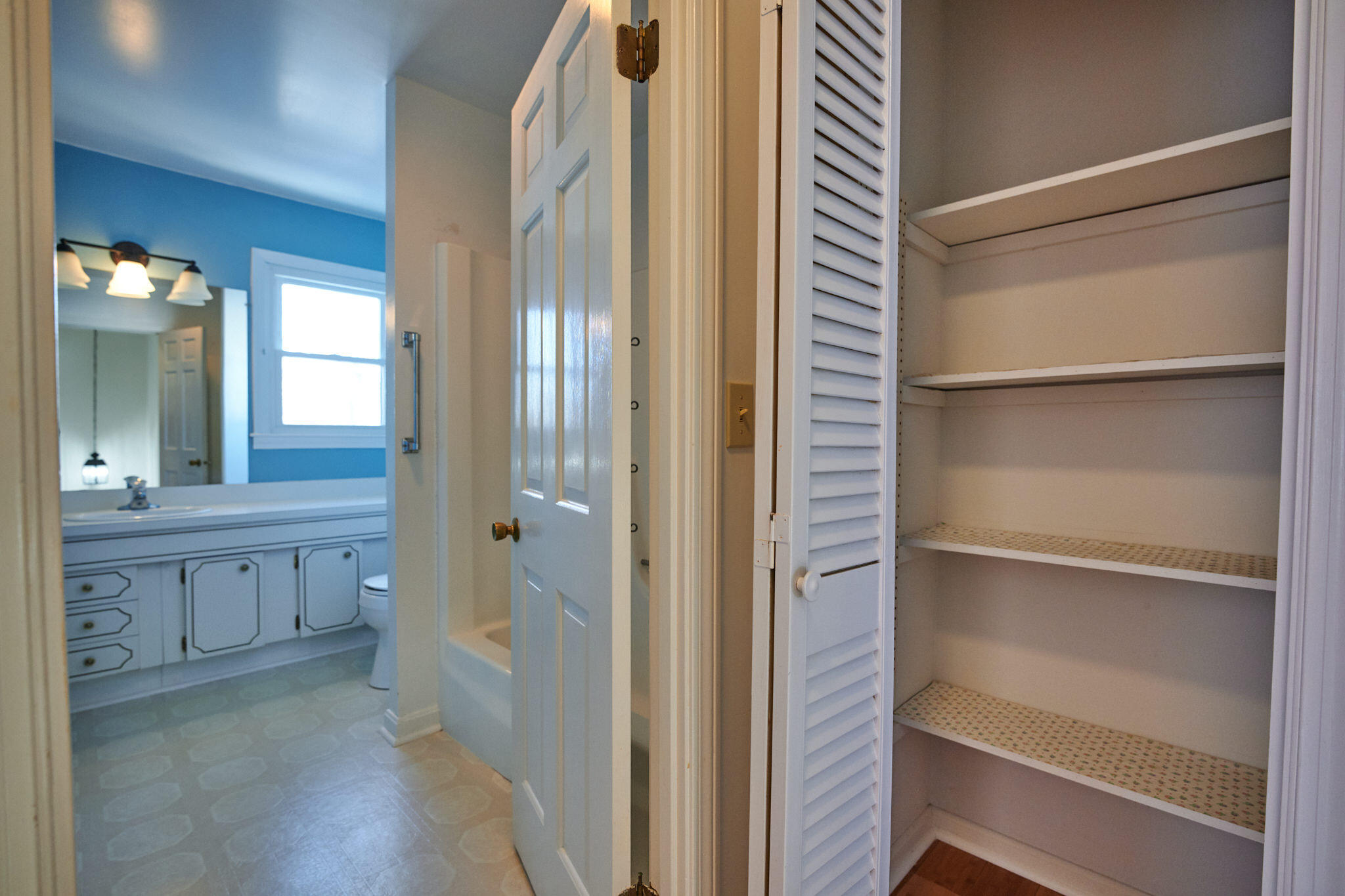 14 Harold Street, Unit 14A Harwich Port, MA 02646 - Photo 15 of 23 a bathroom with a double vanity sink a toilet and a mirror